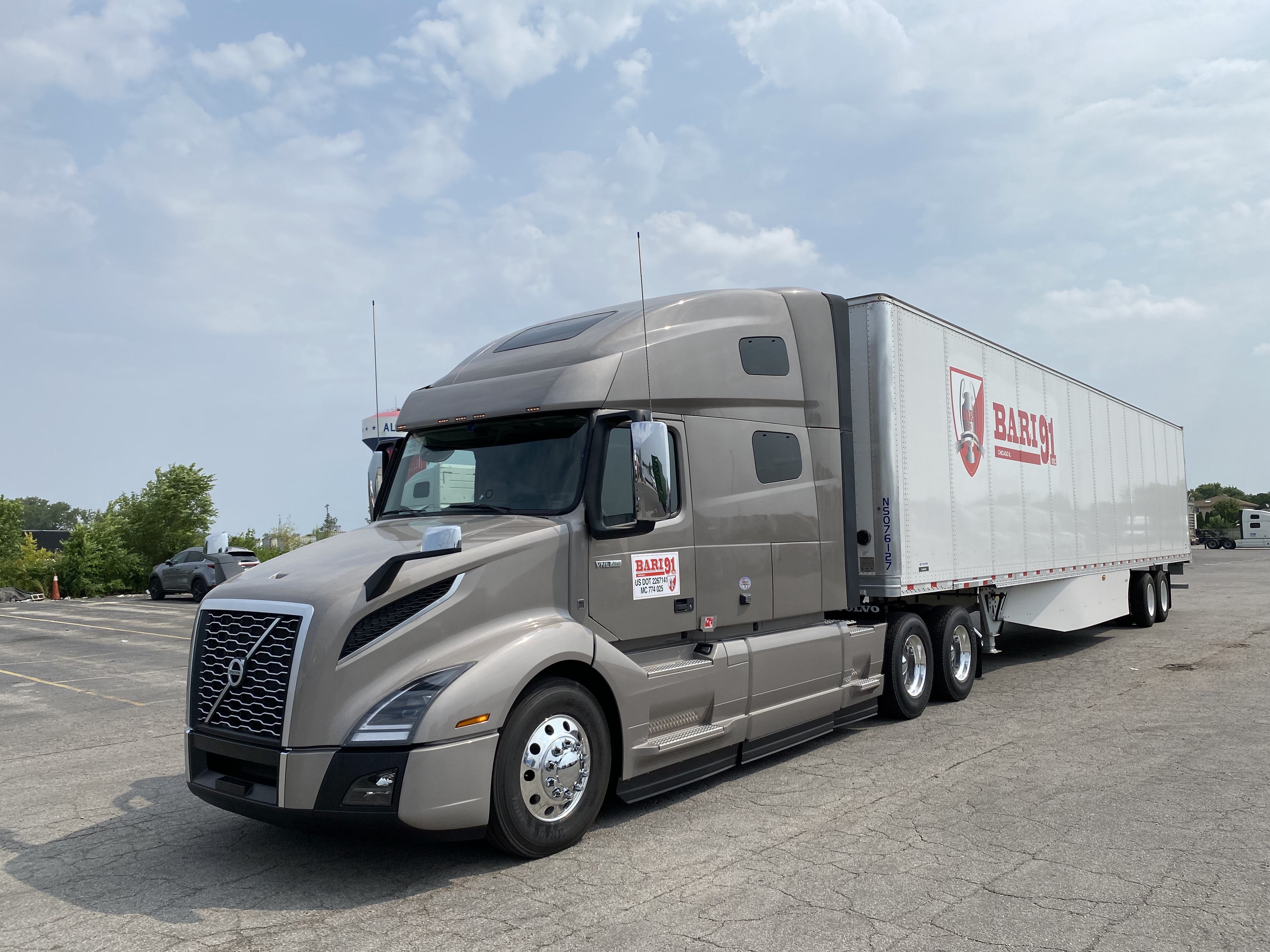 Silver Volvo with trailer